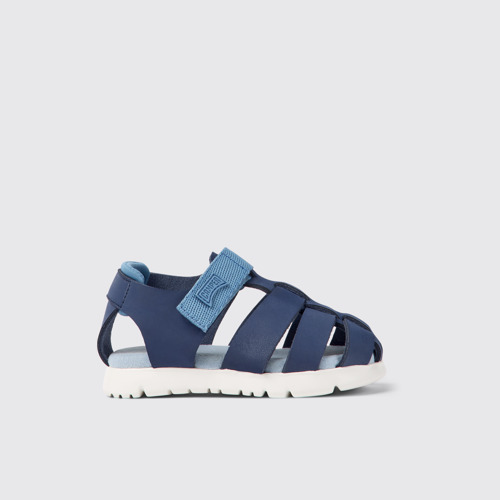 Side view of Oruga Blue leather and textile sandals for kids