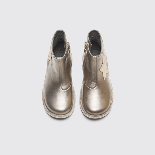 Overhead view of Twins Beige metallic TWIN zip boot for girls