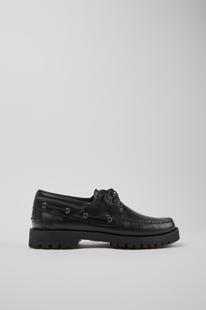 Image of Side view of Nautico Black boat shoe for men