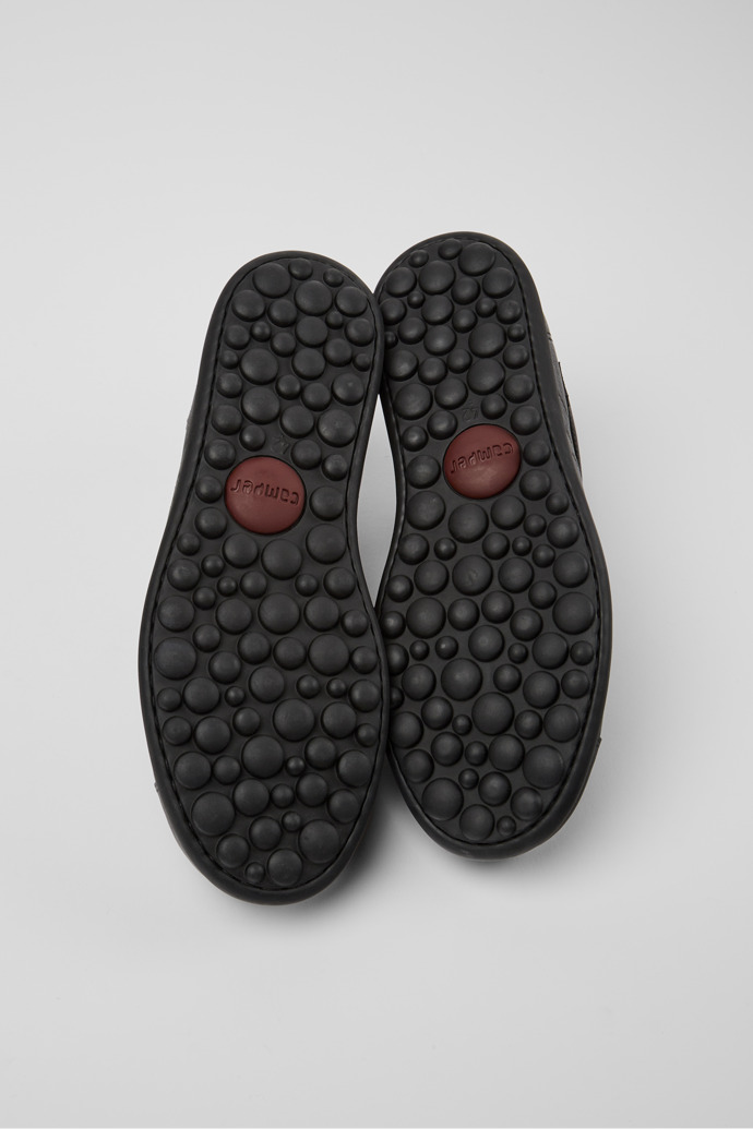 The soles of Pelotas Iconic black shoe for men