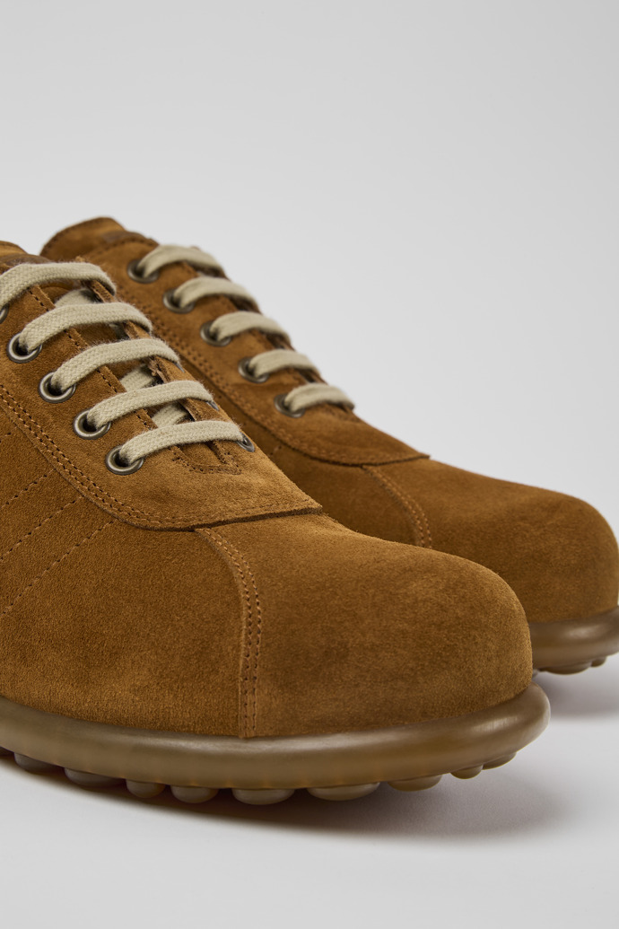 Close-up view of Pelotas Brown nubuck sneakers for men
