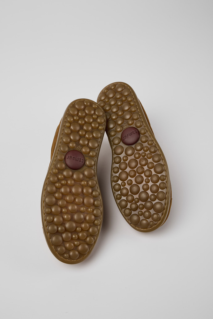 The soles of Pelotas Brown nubuck sneakers for men