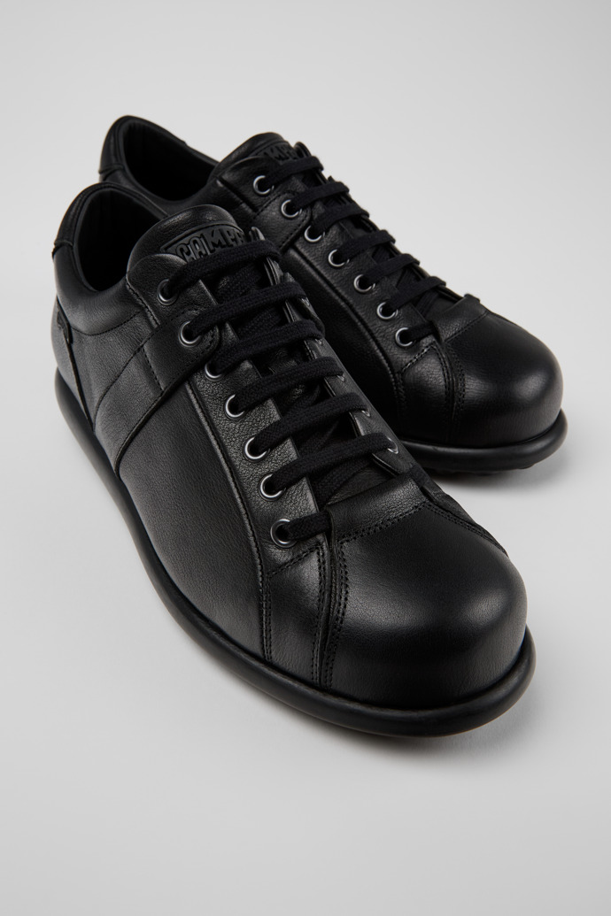 Close-up view of Pelotas Black leather shoes