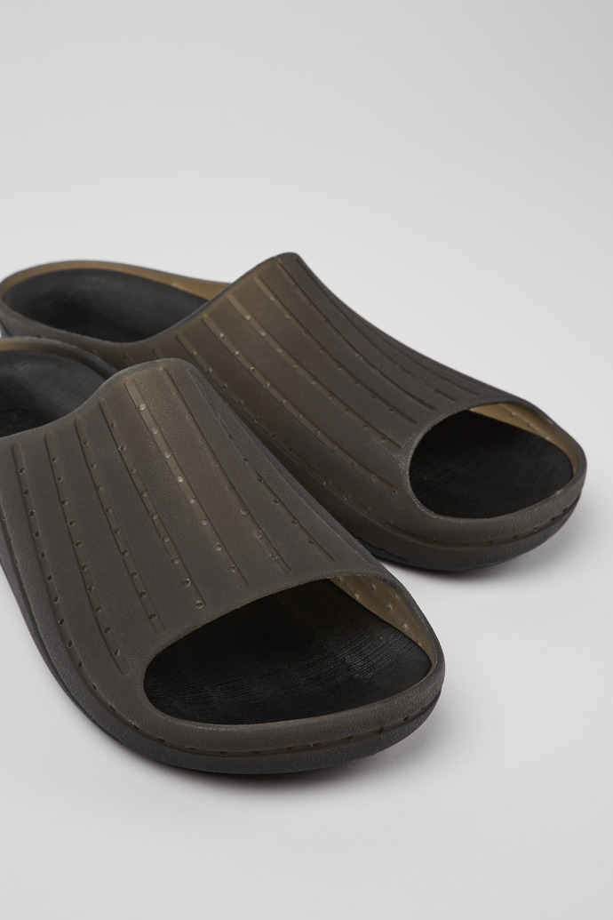 Close-up view of Wabi Black monomaterial sandals for men