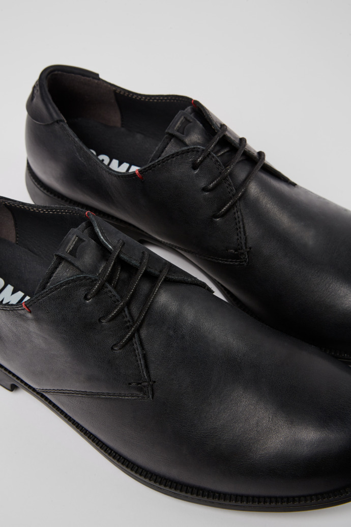 Close-up view of Mil Black leather lace-up shoes for men