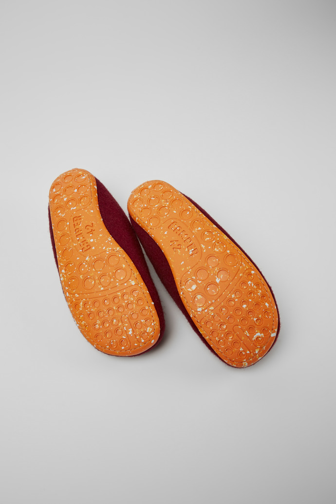 The soles of Wabi Burgundy wool slippers for men