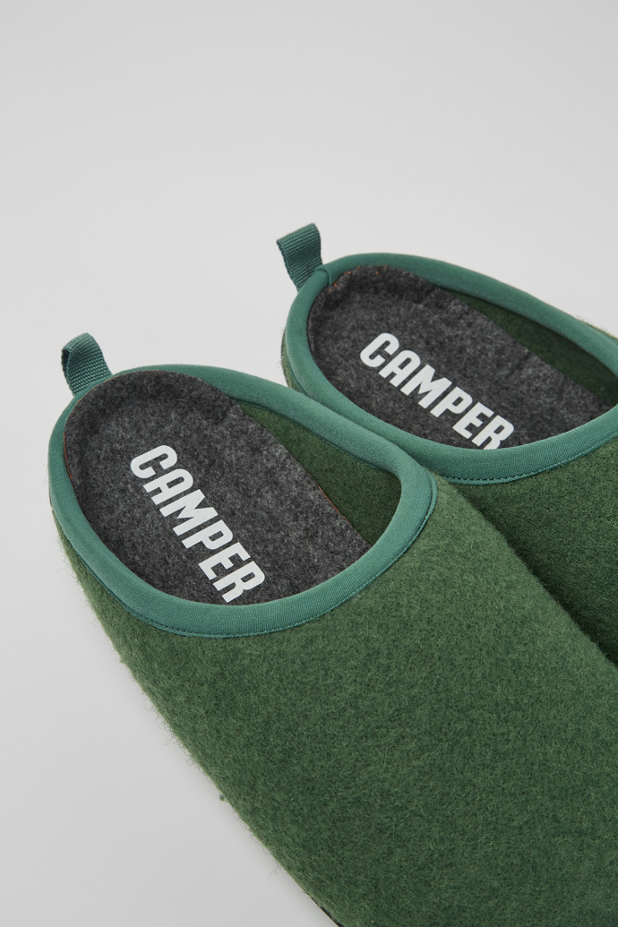 Close-up view of Wabi Green wool slippers for men