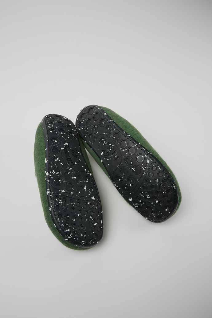 The soles of Wabi Green wool slippers for men