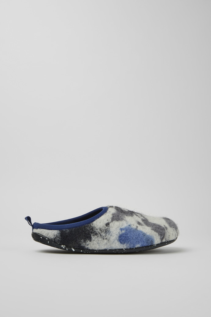 Side view of Wabi Blue and black recycled wool slippers for men