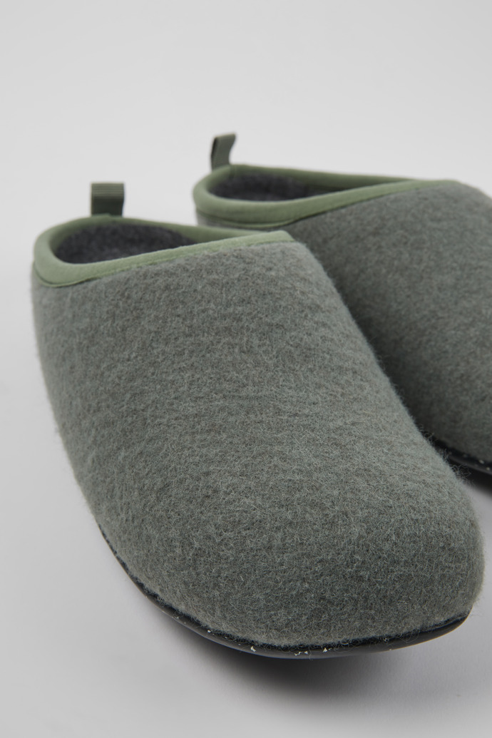 Close-up view of Wabi Green wool slippers for men