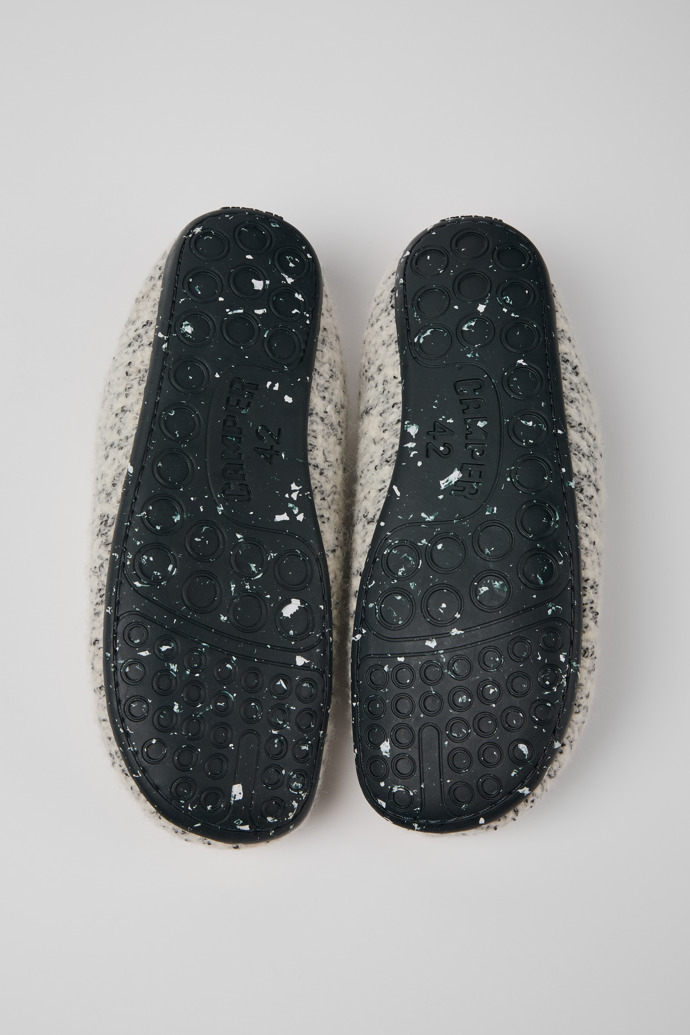 The soles of Wabi White and black Slippers for Men