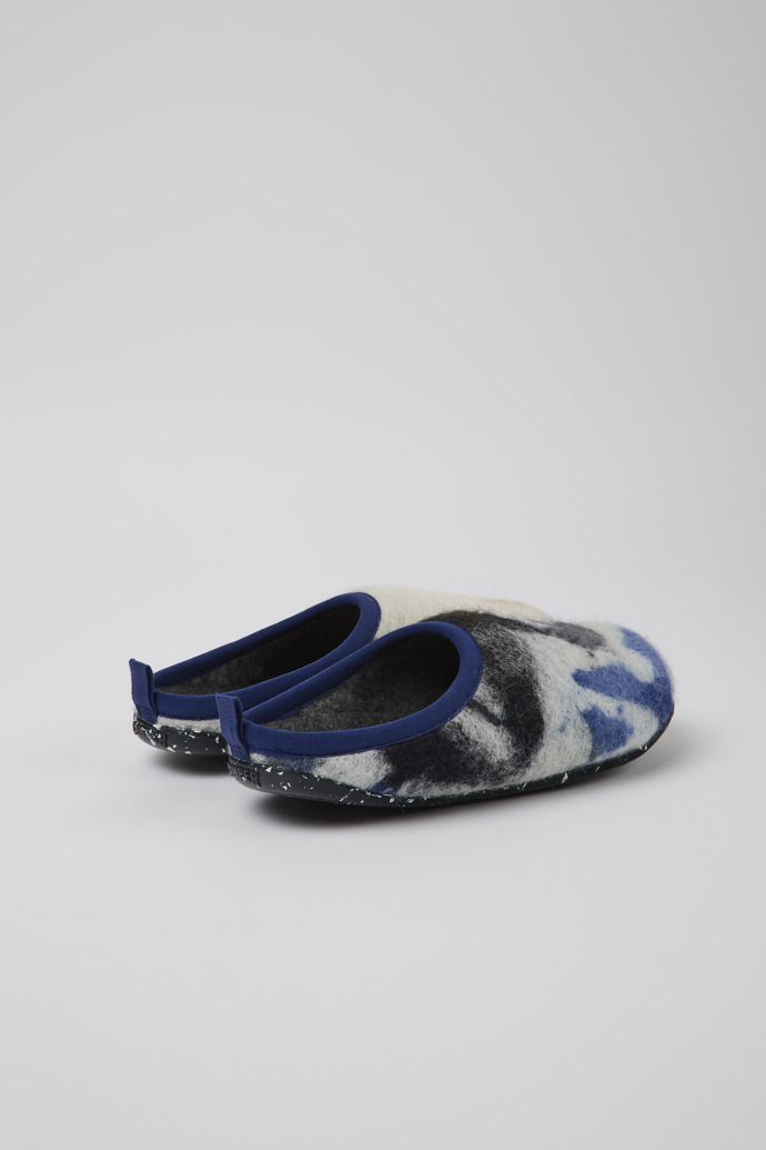 Back view of Wabi Blue, black, and white recycled wool slippers for women