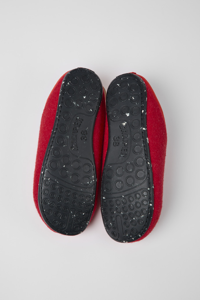 The soles of Wabi Red wool slippers for women