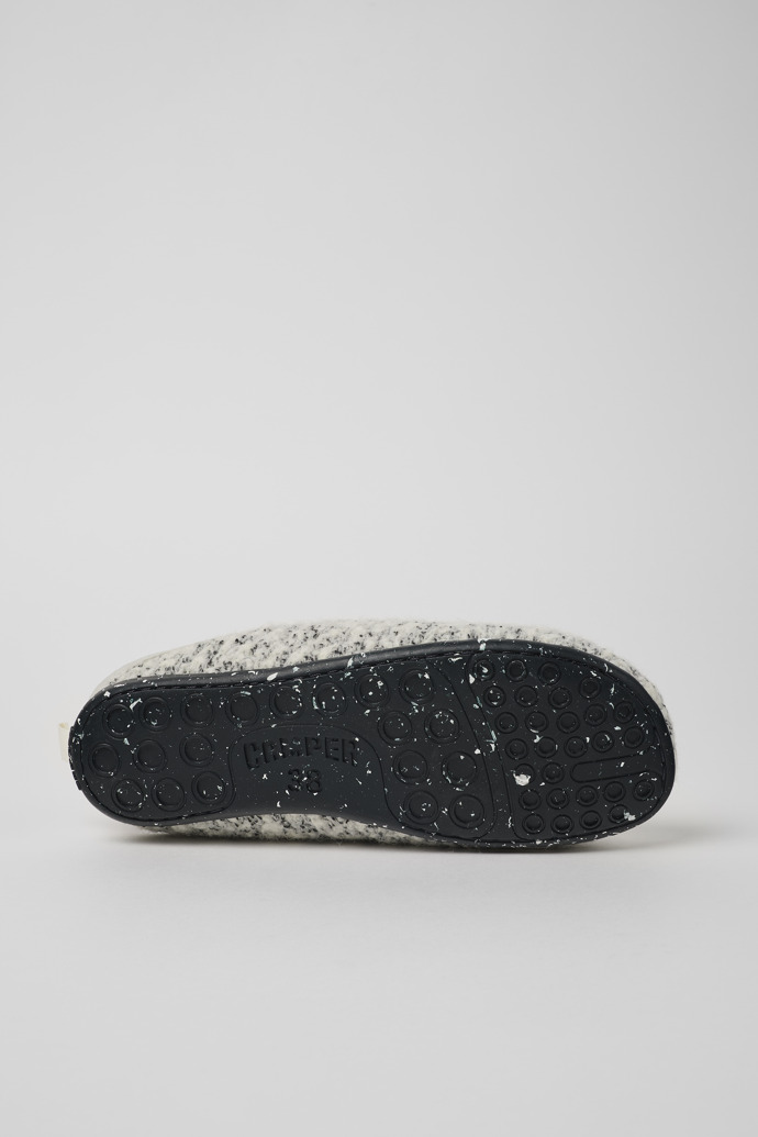 The soles of Wabi White and black Slippers for Women