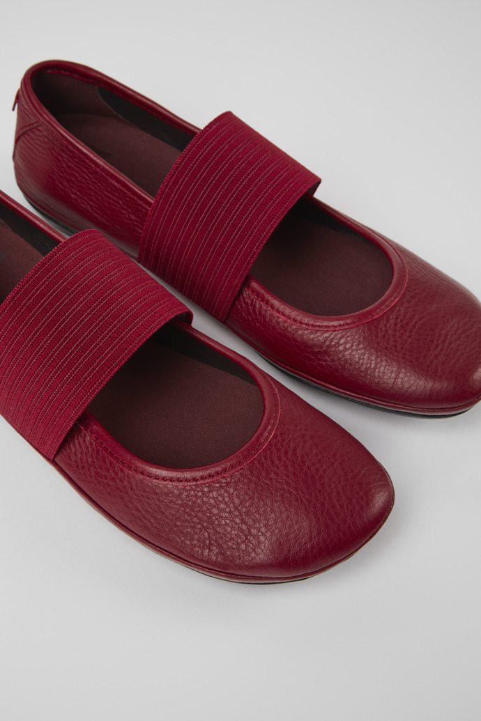 Close-up view of Right Deep red shoe for women