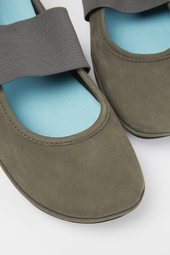 Close-up view of Right Green nubuck ballerina shoes