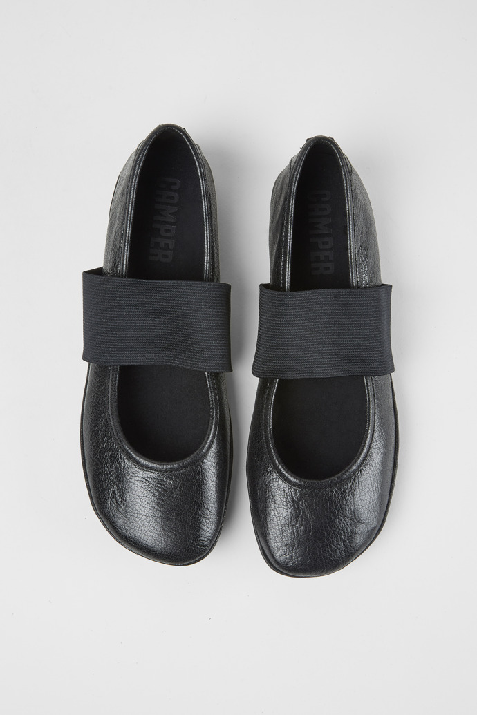 Overhead view of Right Black leather ballerina shoes