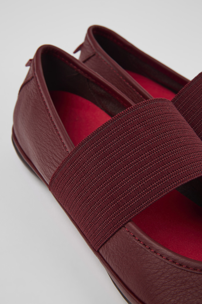 Close-up view of Right Burgundy leather ballerinas for women