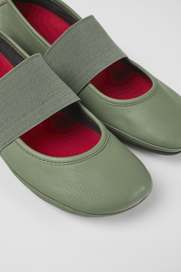 Close-up view of Right Green leather ballerinas for women