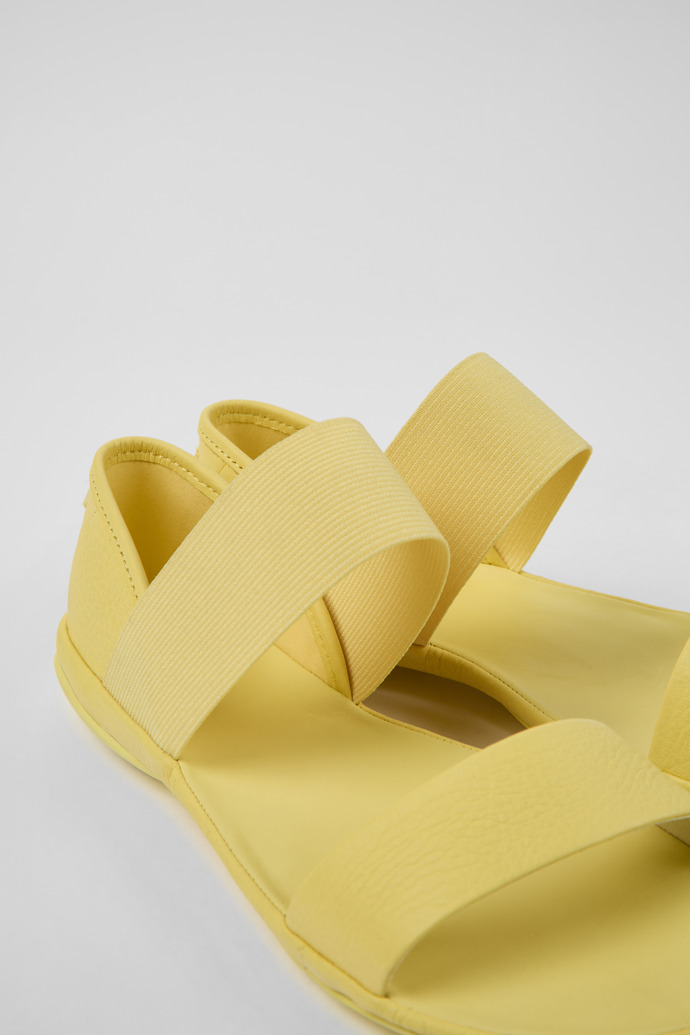 Close-up view of Right Yellow leather sandals for women