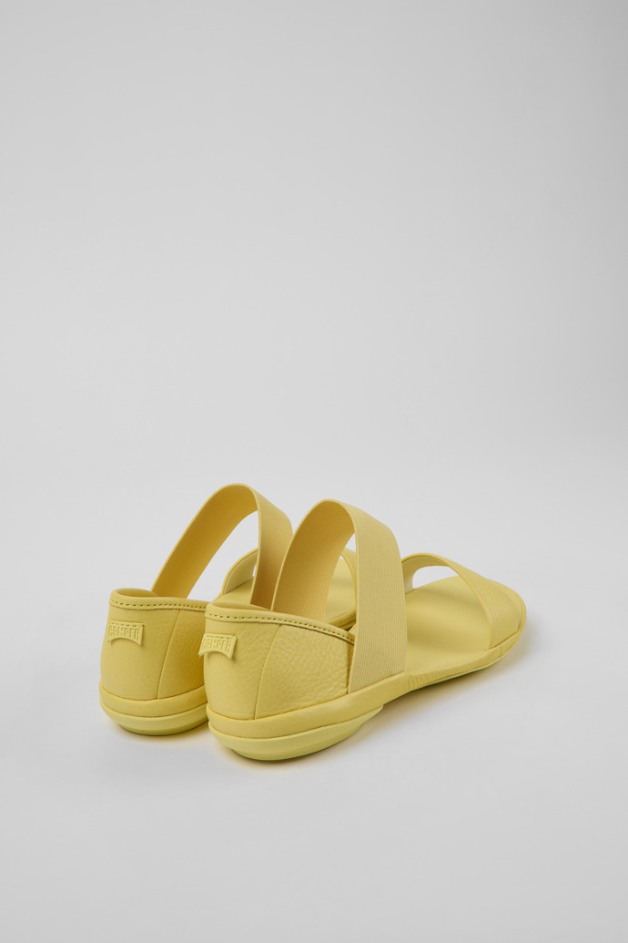 Back view of Right Yellow leather sandals for women