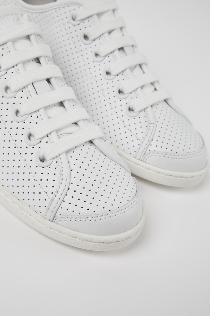 Close-up view of Uno White leather sneakers for women