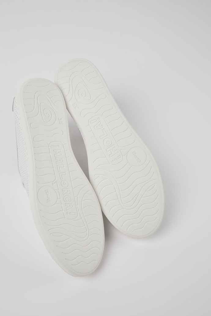 The soles of Uno White leather sneakers for women