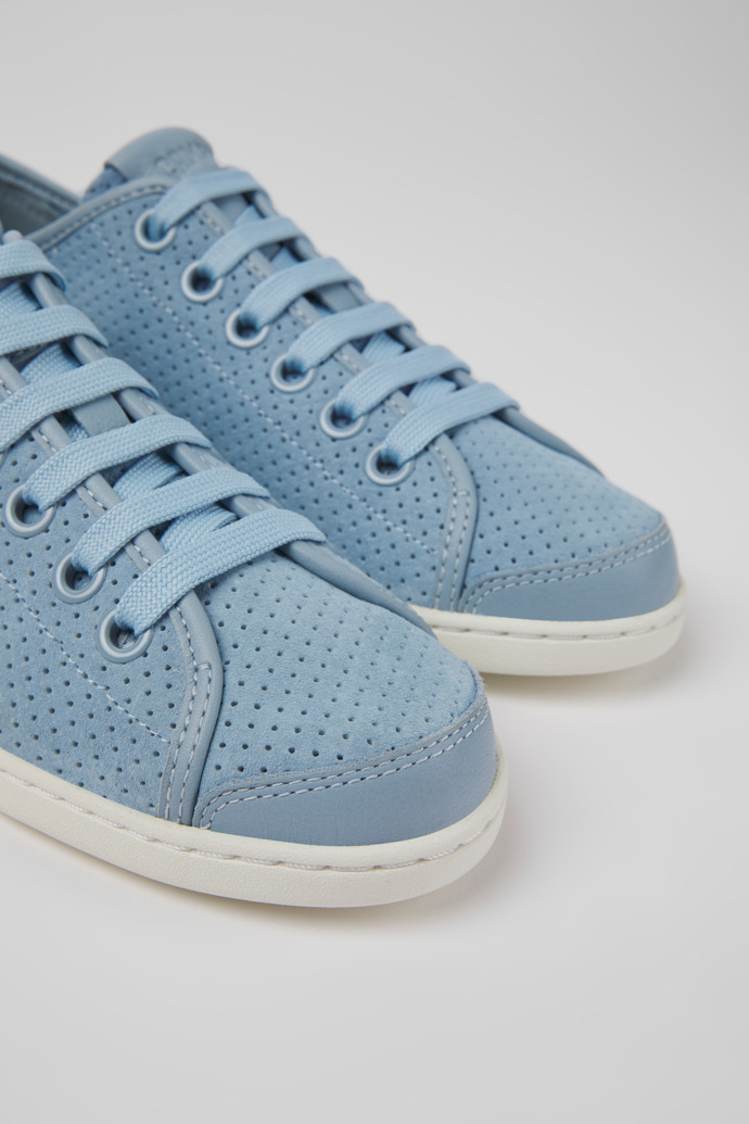 Close-up view of Uno Blue nubuck and leather sneakers for women