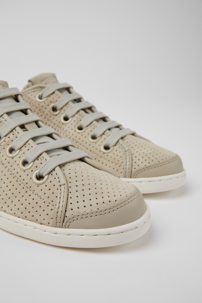 Close-up view of Uno Gray nubuck and leather sneakers for women