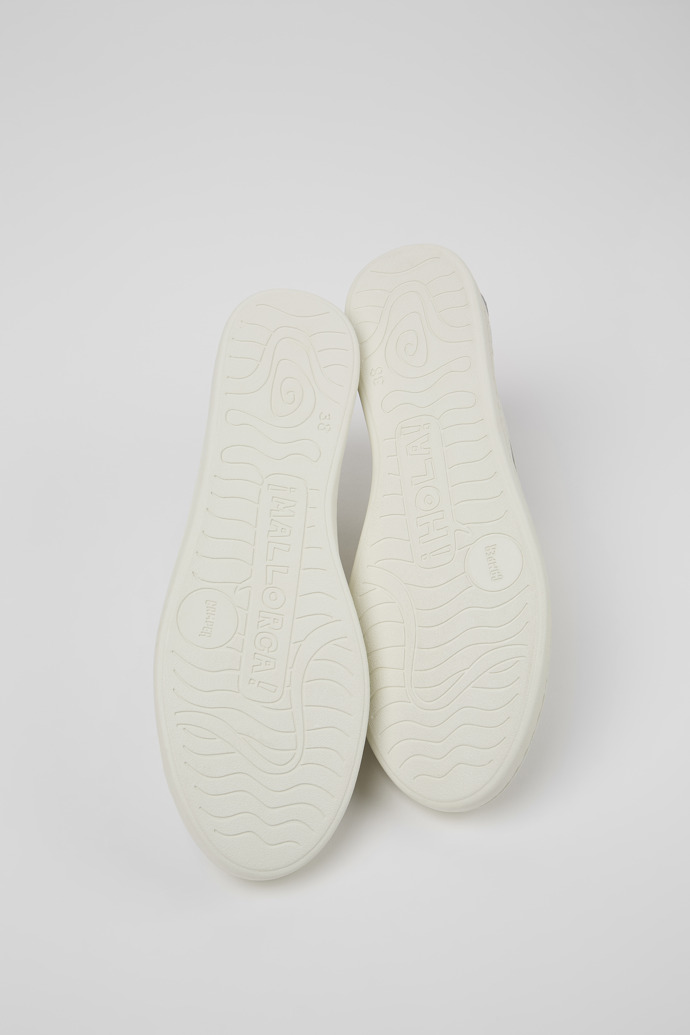 The soles of Uno White Sneaker for Women