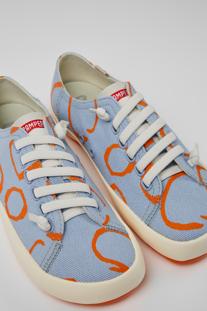 Close-up view of Peu Rambla Blue and orange printed sneakers for women