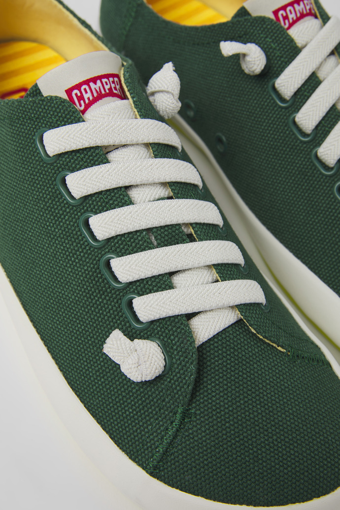 Close-up view of Peu Rambla Green textile sneakers for women