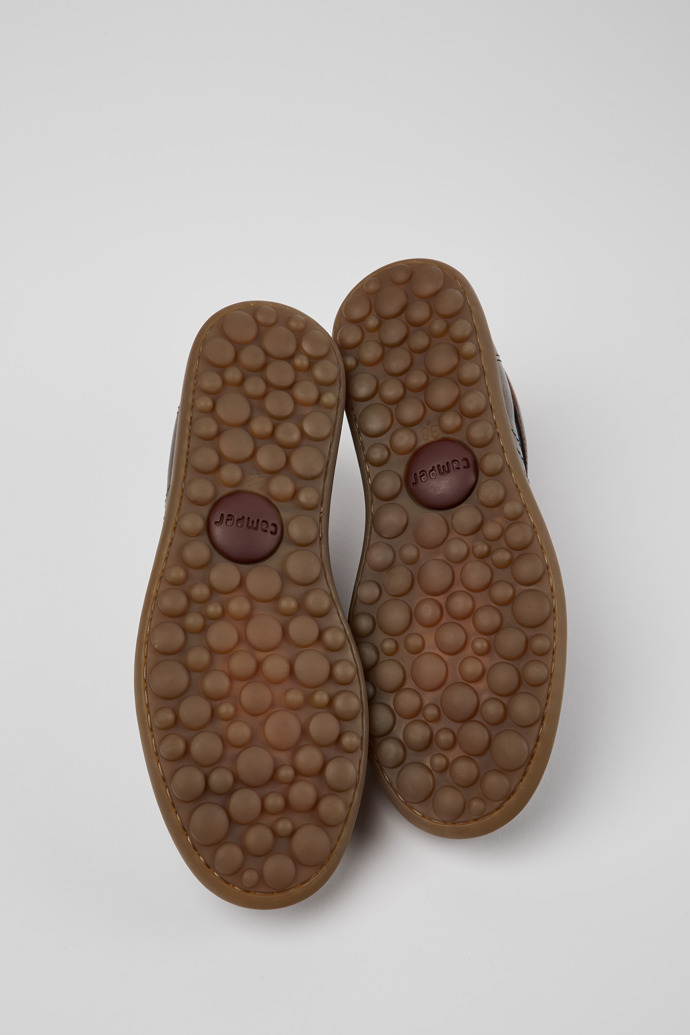 The soles of Pelotas Dark brown shoe for women