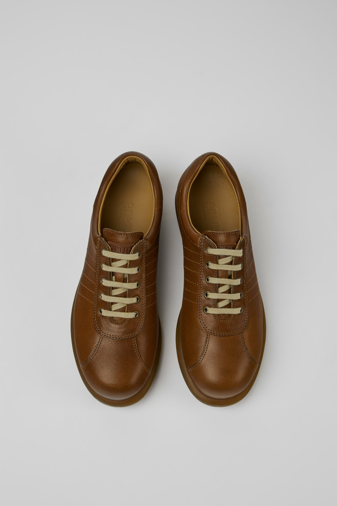 Overhead view of Pelotas Brown leather sneakers for women