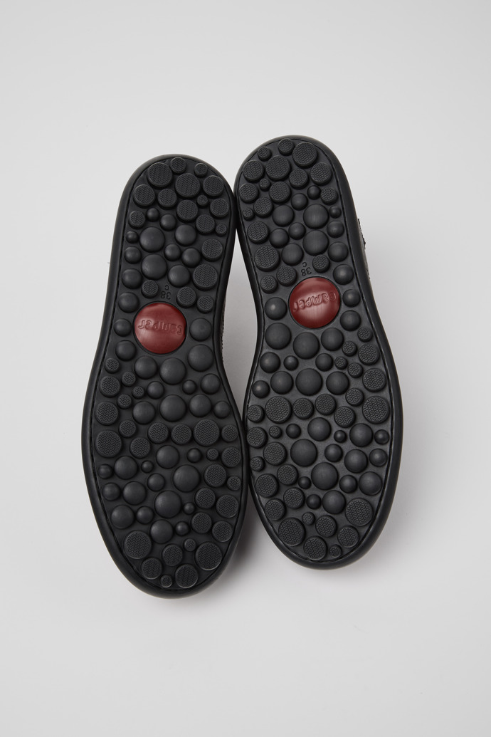 The soles of Pelotas Black and Gray Vegetable-Tanned Leather Shoes for Women.