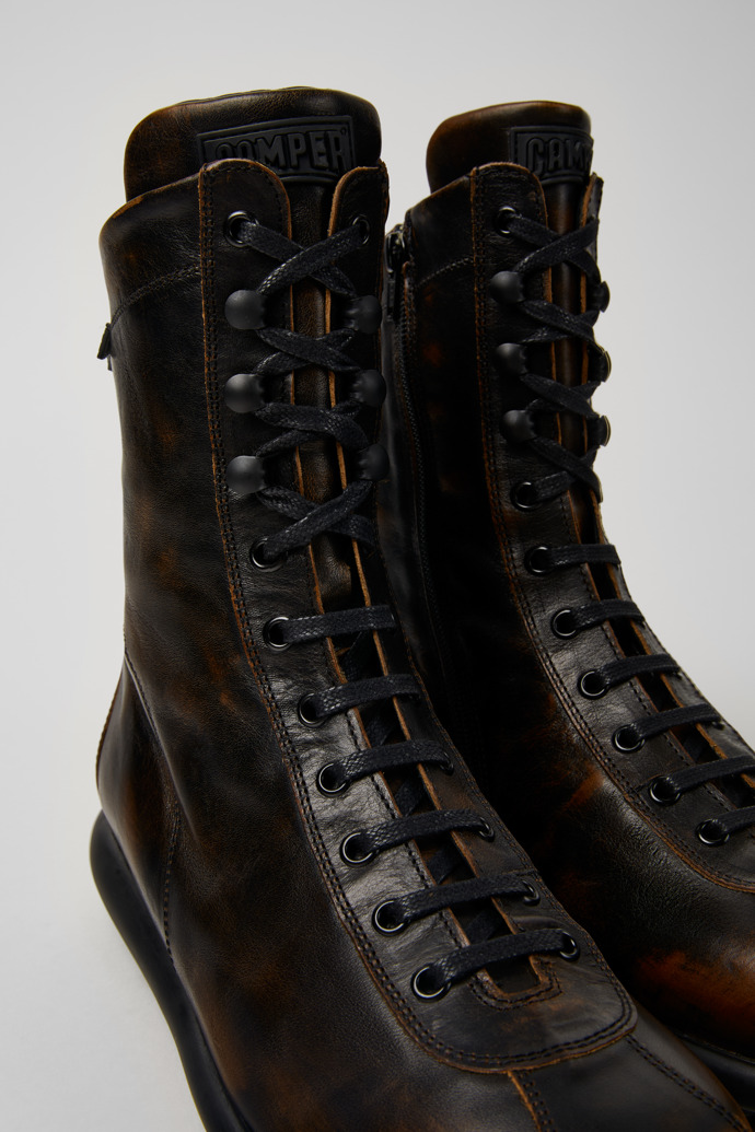 Close-up view of Pelotas Black-brown leather boots for men