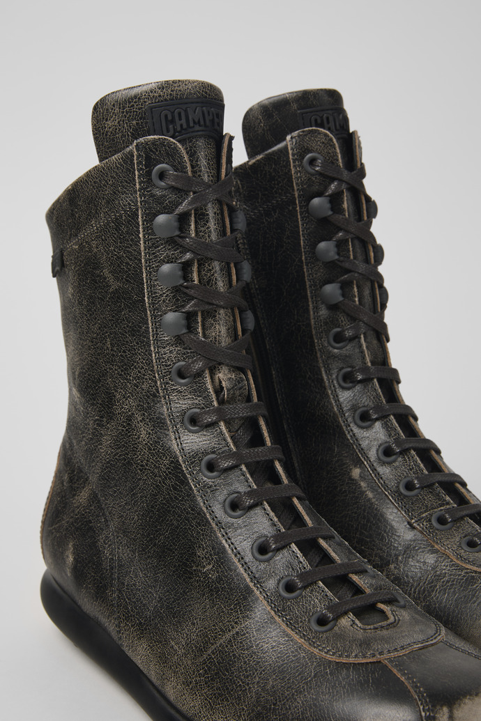 Close-up view of Pelotas Gray leather boots for men