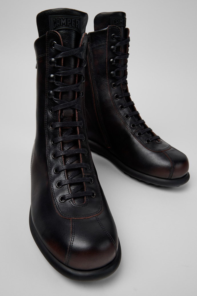 Close-up view of Pelotas Multicolor Leather Mid Boots for Men.