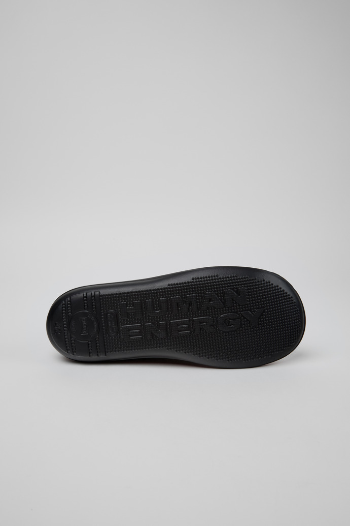 The soles of Beetle Black Leather Ankle Boots for Men.