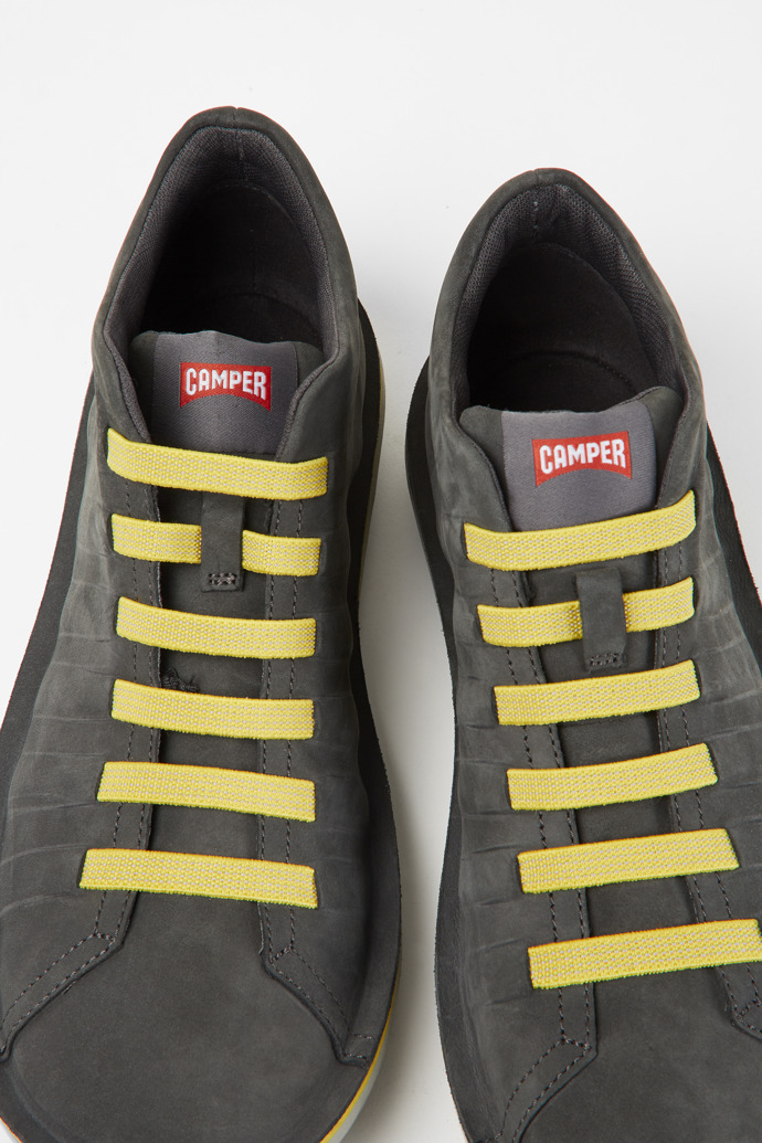 Close-up view of Beetle Grey nubuck sneakers
