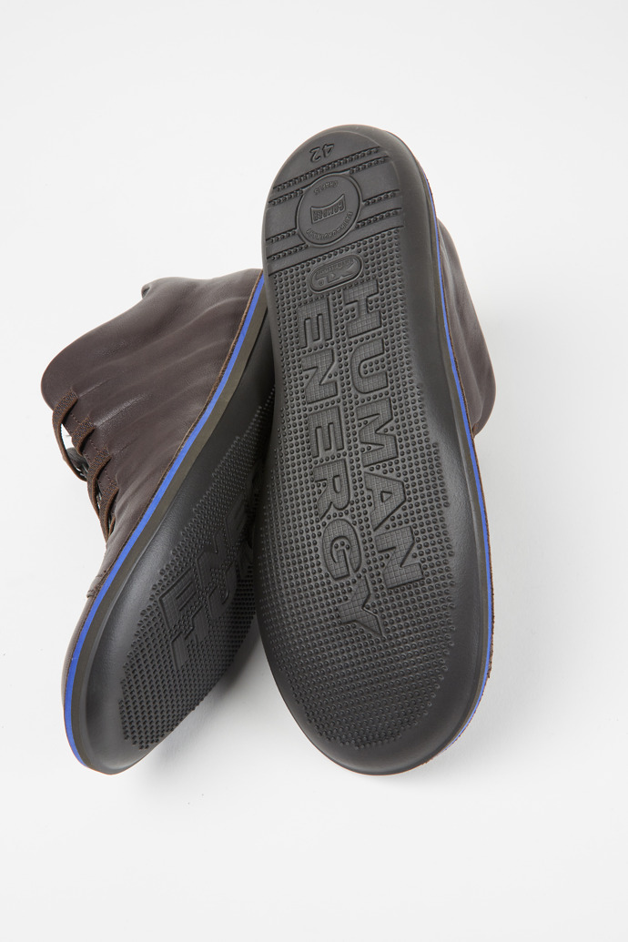 The soles of Beetle Dark brown leather sneakers