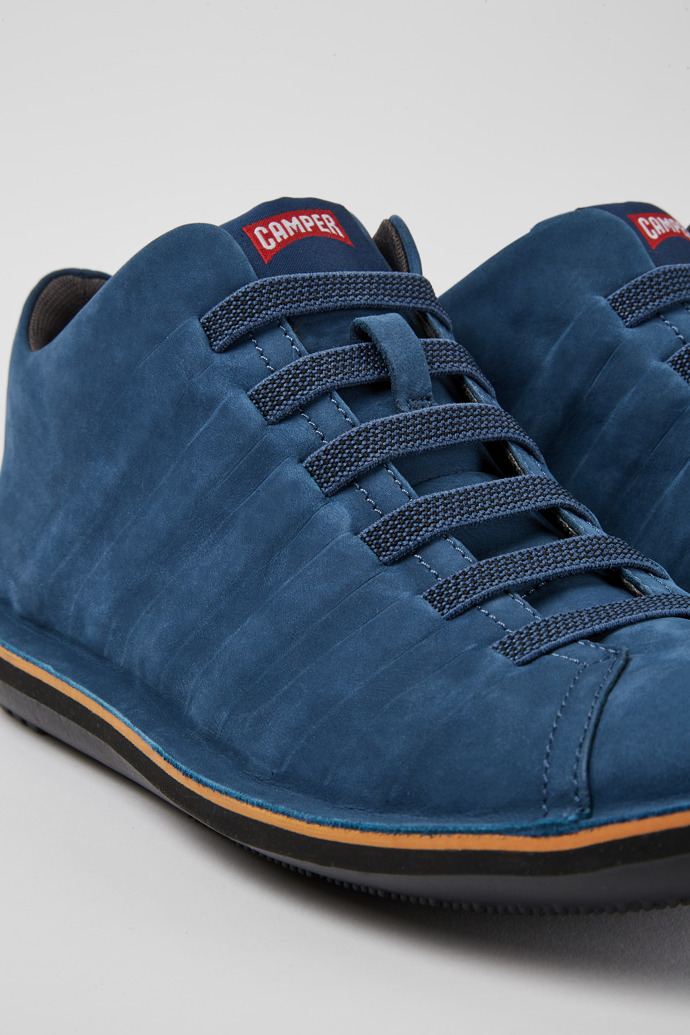 Close-up view of Beetle Blue nubuck sneakers