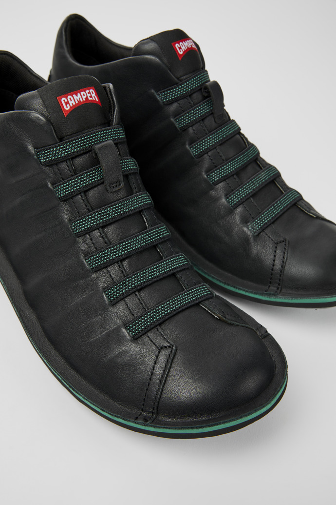 Close-up view of Beetle Black leather ankle boots for men