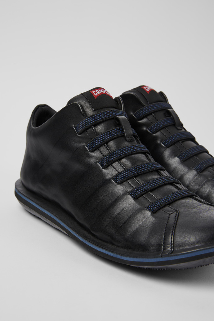 Close-up view of Beetle Black leather ankle boots for men
