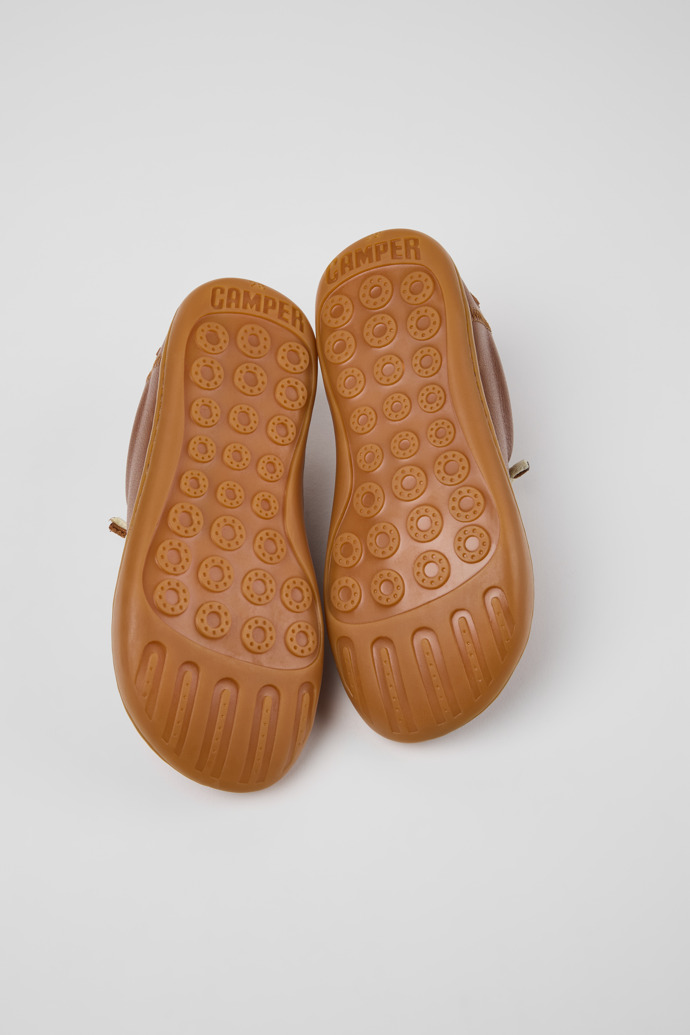 The soles of Peu Brown Leather Shoes for kids.