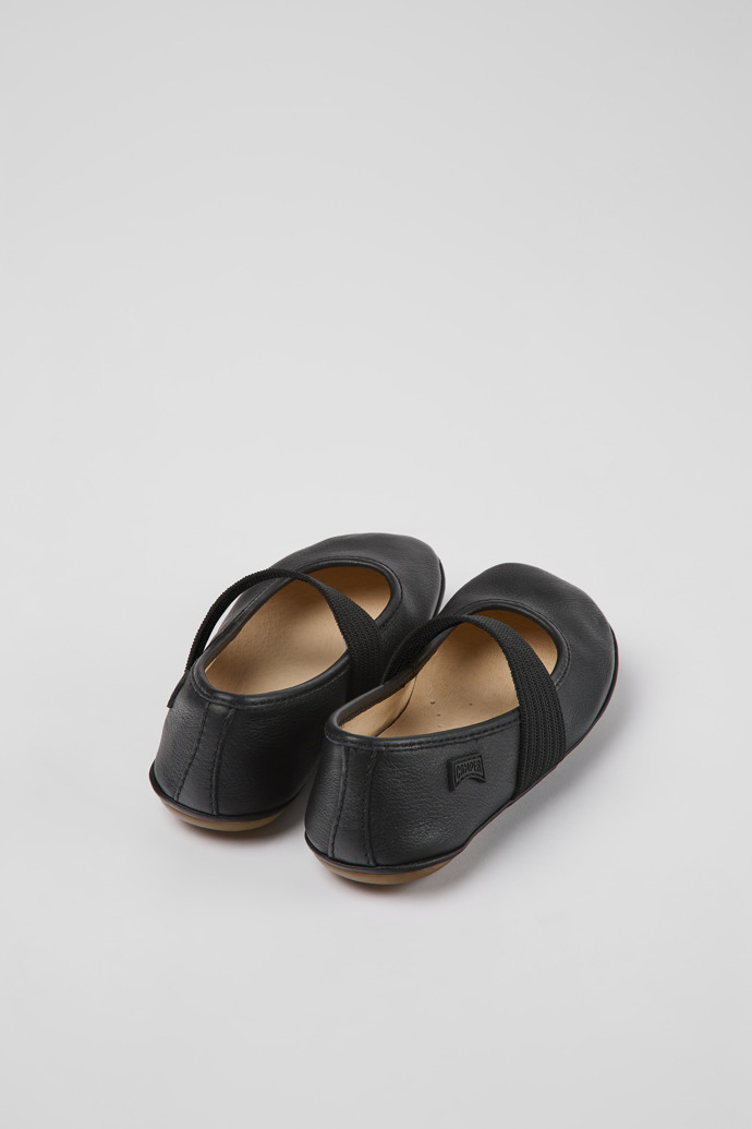 Back view of Right Black leather ballerinas for kids