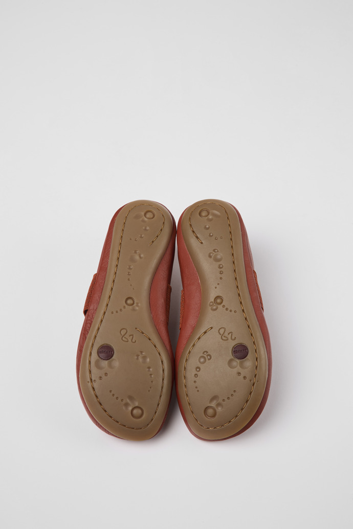 The soles of Right Red leather ballerinas for kids
