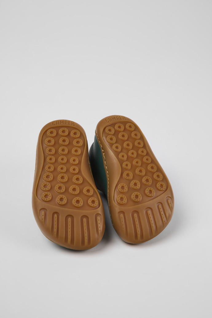 The soles of Peu Green leather shoes for kids