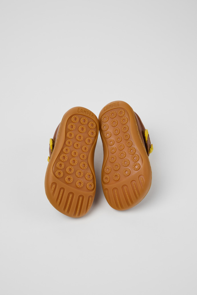 The soles of Peu Brown Leather Ankle Boots for Kids.