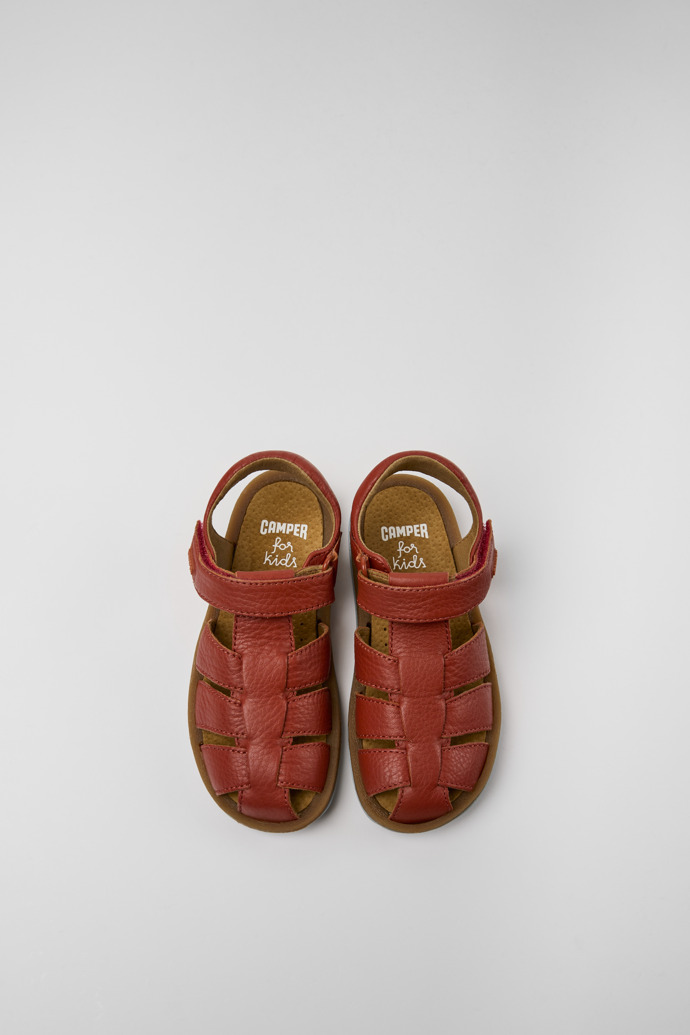 Overhead view of Bicho Red leather sandals for kids